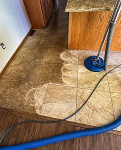 Deep Cleaning Tile and Grout Floor with Professional Equipment | Ultra Clean, LLC residential-tile-and-grout-cleaning-portion-cleaned-another-portion-dirty