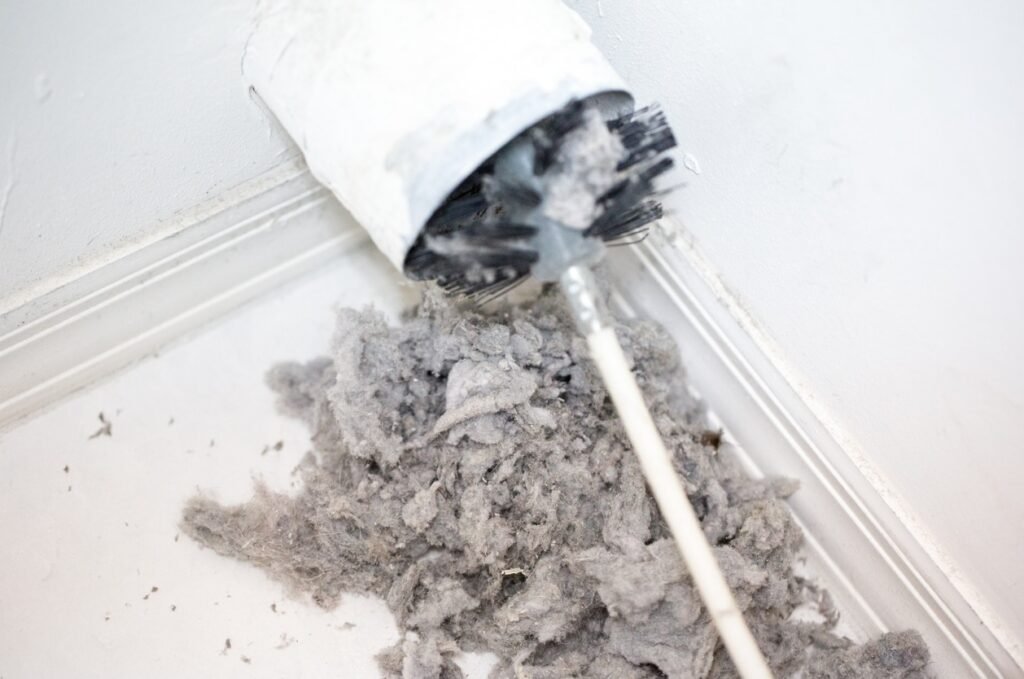 Clogged dryer vent being cleaned in a Frisco, TX home by Ultra Clean