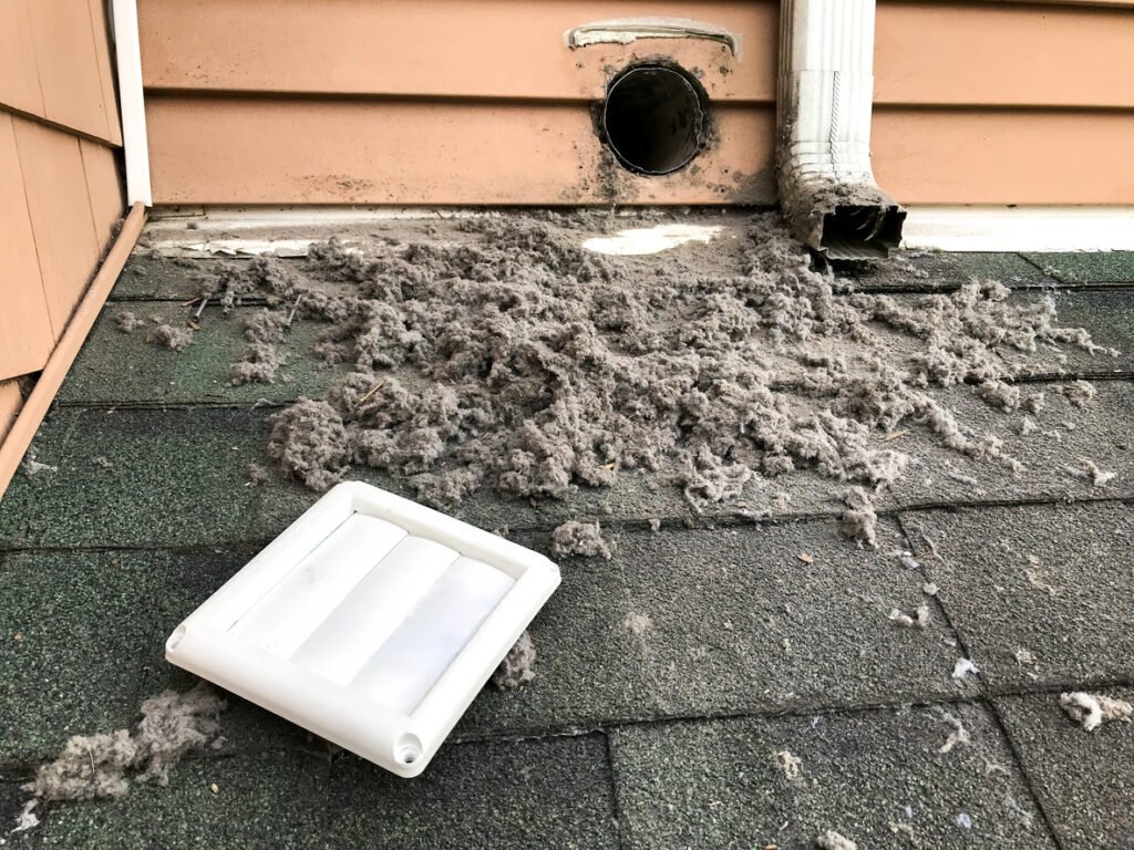 Dryer Vent Cleaning Roof Lint Removal in Plano | Ultra Clean Dryer vent cleaning and roof lint removal in a Plano, TX home by Ultra Clean